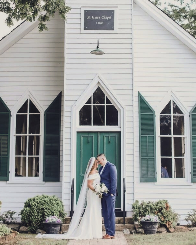couple in front of chapel